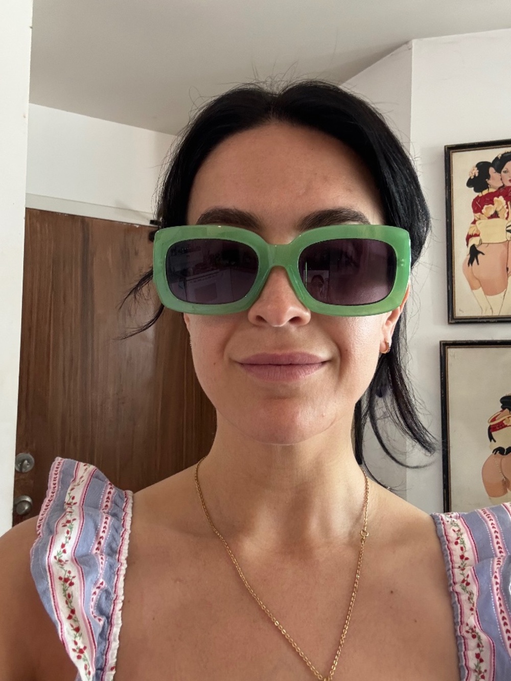 Green oversized plastic sunglasses